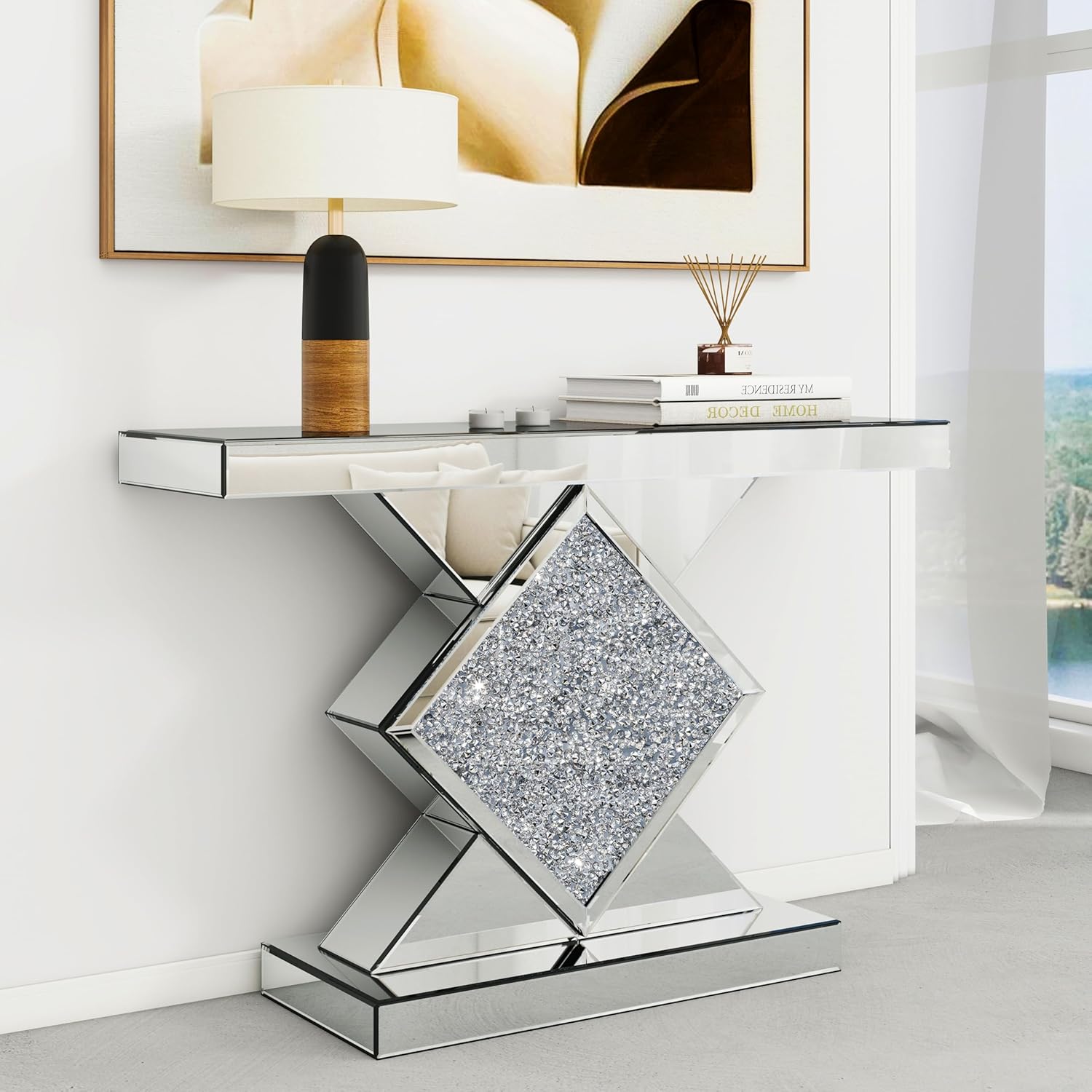 Verra Luxe Home Mirrored Diamond Console Table with diamond-shaped crystal pedestal, beveled mirror panels, and a sleek reflective surface for glamorous contemporary interiors.