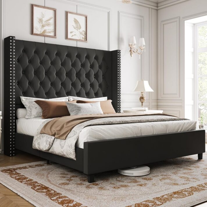 Verra Luxe Home black tufted king-size bed frame with tall velvet headboard, featuring nailhead trim, white bedding, and a luxurious bedroom setting.
