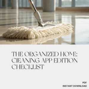 The Organized Home: Cleaning App Edition Checklist cover visible on a glossy floor, with a white microfiber mop in the foreground and a silver handle, suggesting a modern cleaning setup