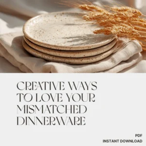 Beige speckled ceramic dinner plates stacked on a soft cloth with golden wheat stalks, reflecting Creative Ways to Love Your Mismatched Dinnerware from Verra Luxe Home. PDF download.