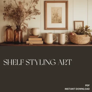 Earthy warm shelf styling with amber glass vases, stacked books, cream ceramic mugs, a woven basket, and framed botanical art on a wooden shelf.