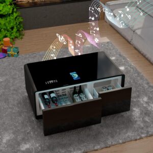 Verra Luxe Home smart coffee table with black finish, built-in fridge and sliding drawers, featuring 20W Bluetooth speakers and wireless charging, displayed in a modern living room.