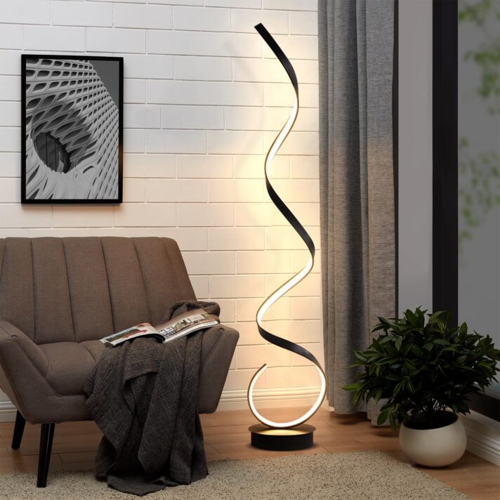 Modern Spiral LED Floor Lamp by Verra Luxe Home featuring a sculptural spiral black metal frame with warm LED illumination in a living room setting.
