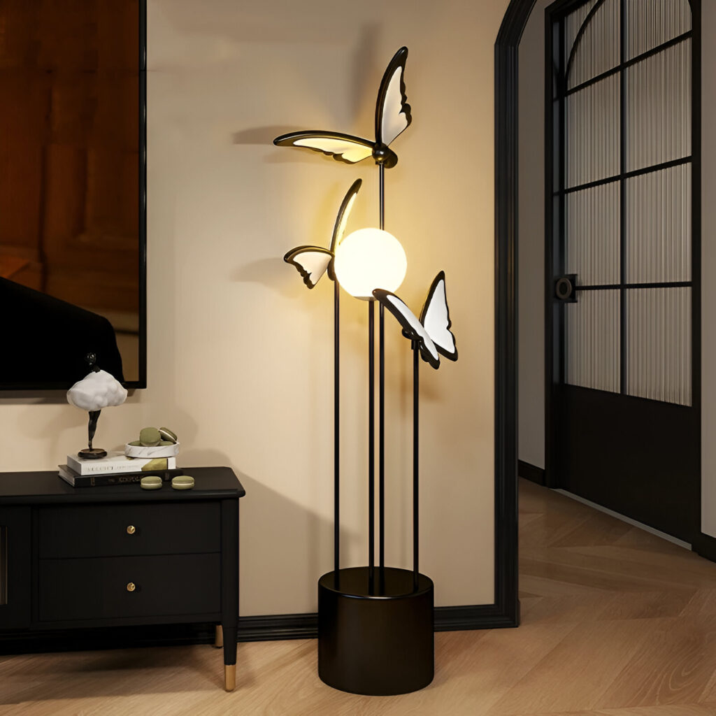 Verra Luxe Home modern LED floor lamp with black metal stem and butterfly-inspired lampshades, 51 inches tall, emitting a warm white glow.