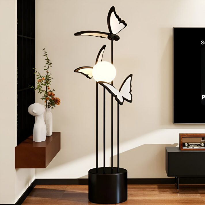 Verra Luxe Home Modern LED Floor Lamp with butterfly motif, a tall black lamp featuring butterfly-shaped light accents and a circular base for living room or bedroom ambiance