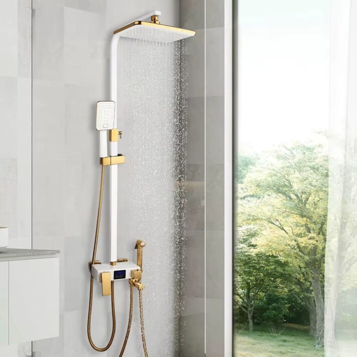 Verra Luxe Home LED thermostatic rainfall shower system in white and gold finish, wall-mounted with rainfall head, handheld shower, and digital display