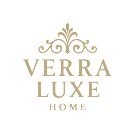 Verra Luxe Home logo in gold on a black background, featuring an ornate crest and bold serif typography, conveying luxury decor branding and sophistication.