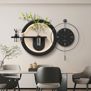 Verra Luxe Home Minimalist LED Wall Art with Clock and Green Plant Design in a black circular metal wall sculpture featuring a built-in clock and plant accent