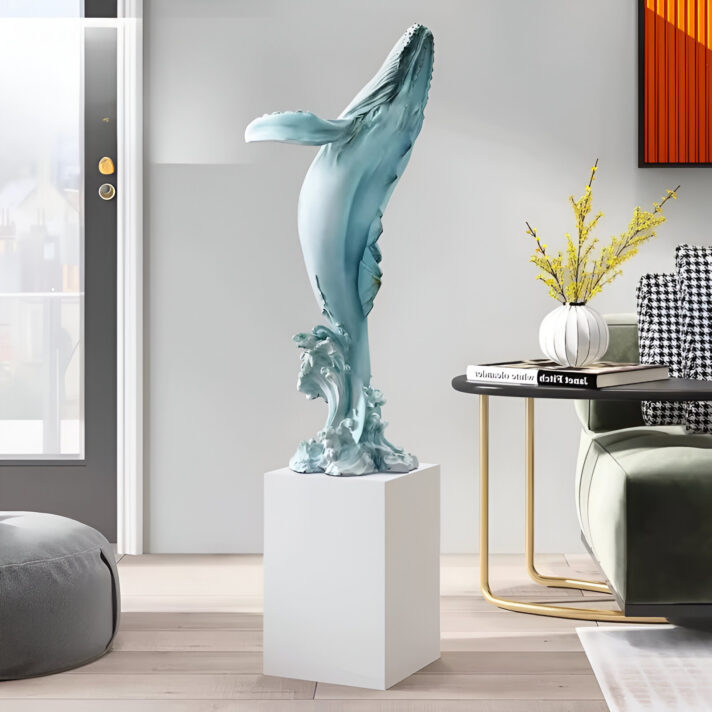 Teal resin whale sculpture in a modern living room setting, large decorative whale artwork with a smooth finish and flowing form, by Verra Luxe Home